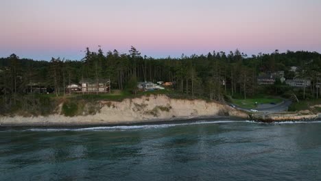 Aerial-view-of-mansions-lining-the-Whidbey-Island-shoreline-overlooking-the-ocean