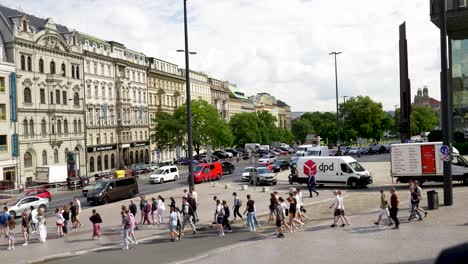 prague city street scene with traffic and people