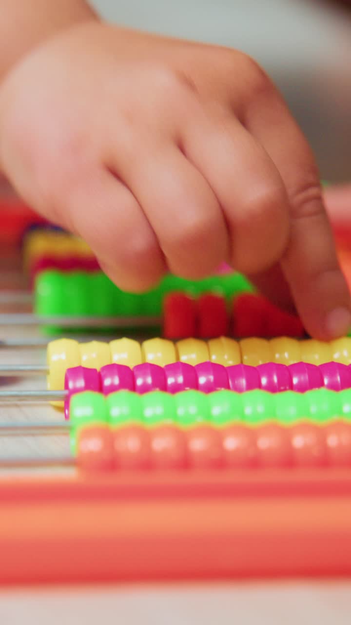 Engaging Learning Experience: Close-Up Views of a Colorful Abacus for Early Numeracy Skills Development in Young Minds