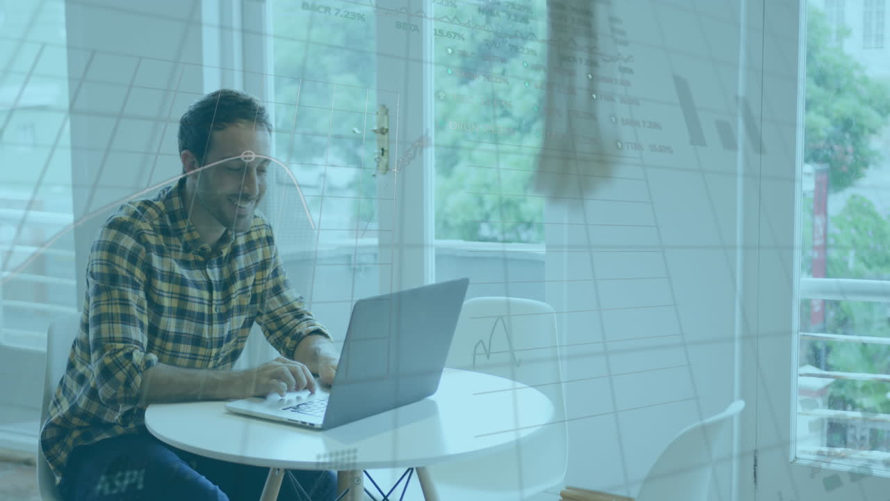 Animation of statistical, stock market data processing over biracial man using laptop at office