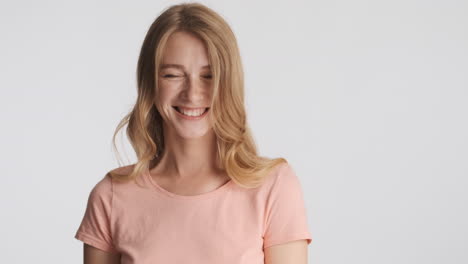 caucasian woman nodding on camera.