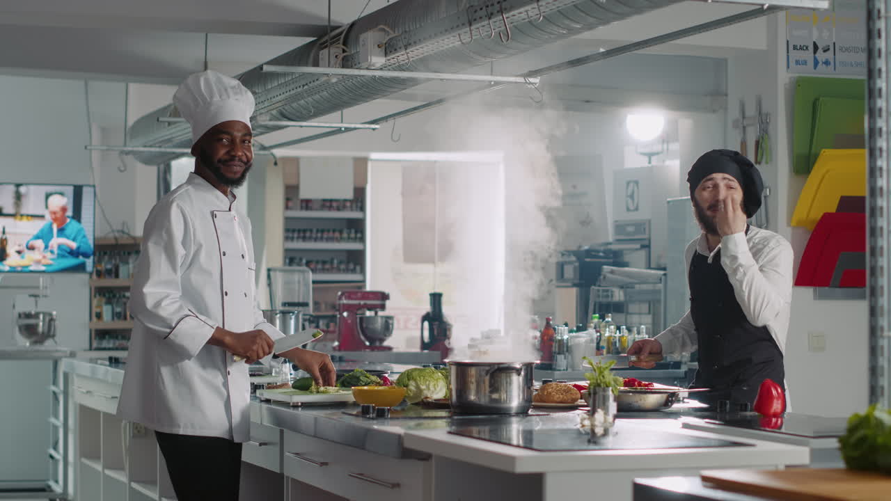 POV of multiethnic team of chefs recording cooking show video