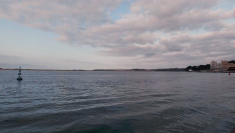 santander bay view from a ferry boat during sunset cloudy summer day arriving to pedrena