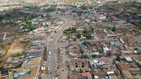 aerial of several neighborhoods in a busy kenyan town