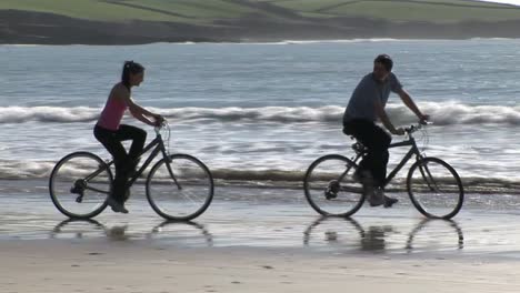 couple relaxing on beach