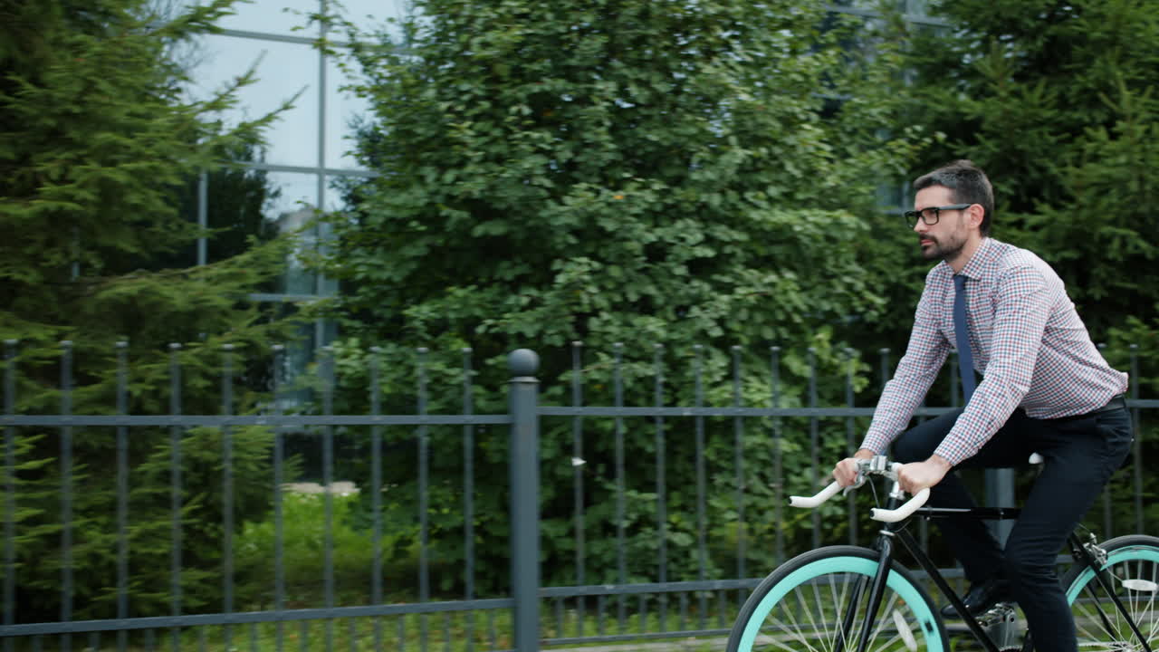 Businessman Riding a Bike in the City