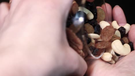 Nuts with raisins in a glass