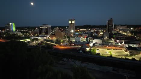 Jackson,-Michigan-downtown-at-night-with-drone-video-wide-shot-moving-in