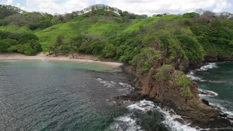 Rocky-peninsula-outcropping-of-Playa-Penca,-Guanacaste-Region,-Costa-Rica