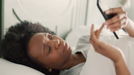 black woman, phone or tired yawn in bedroom