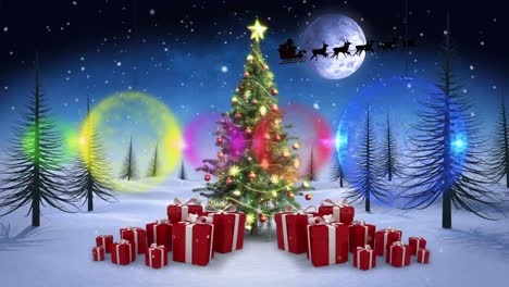 decoraciones coloridas colgando contra el árbol de navidad y regalos en el paisaje de invierno