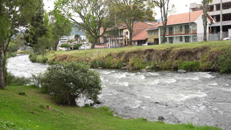 a river in the city of cuenca, ecuador