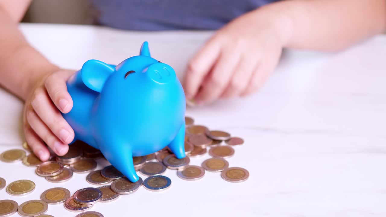 Piggy Bank saving business standing on a pile of coins concept
