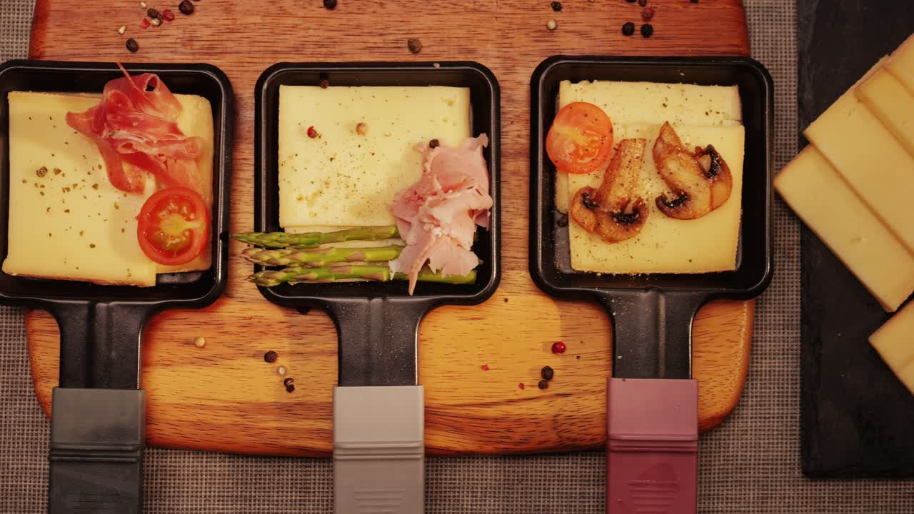 Italian or Spanish restaurant with traditional tapas food, Spanish cuisine, delicious tapas and cheese plate, bruschetta with cheese, olives dry tomatoes and tasty sandwich bar appetizer, buffet