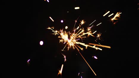 Lit-party-sparkler-sparkling-on-black-background