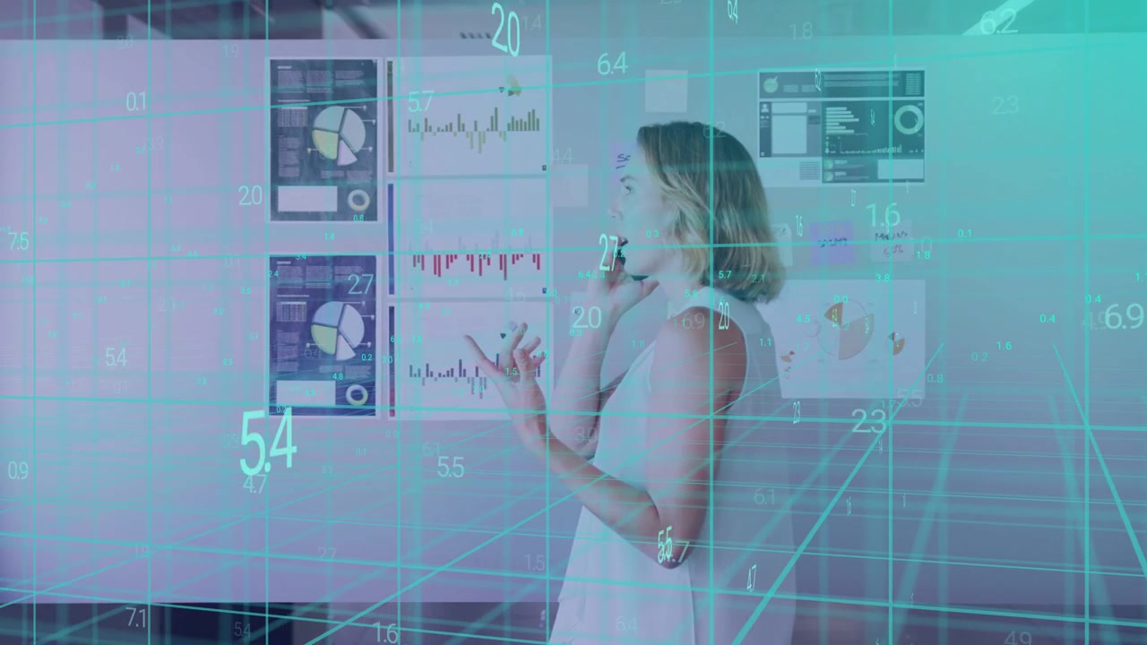 Analyst reviewing charts, phoning to discuss while teal grid highlighting graphs as she gesturing