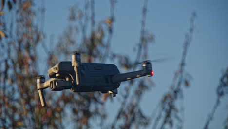 dji mavic drone hovering in nature