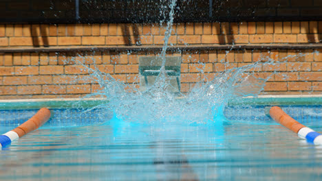 low section of man ready to jump in pool 4k