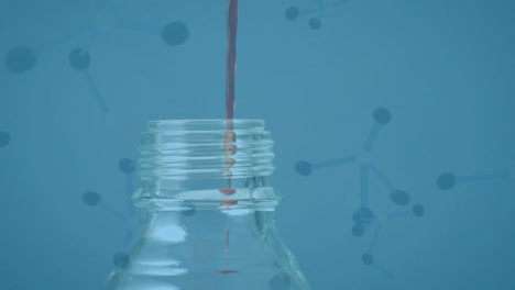 vaso de laboratorio con moléculas en primer plano