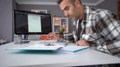 Man working in home office.