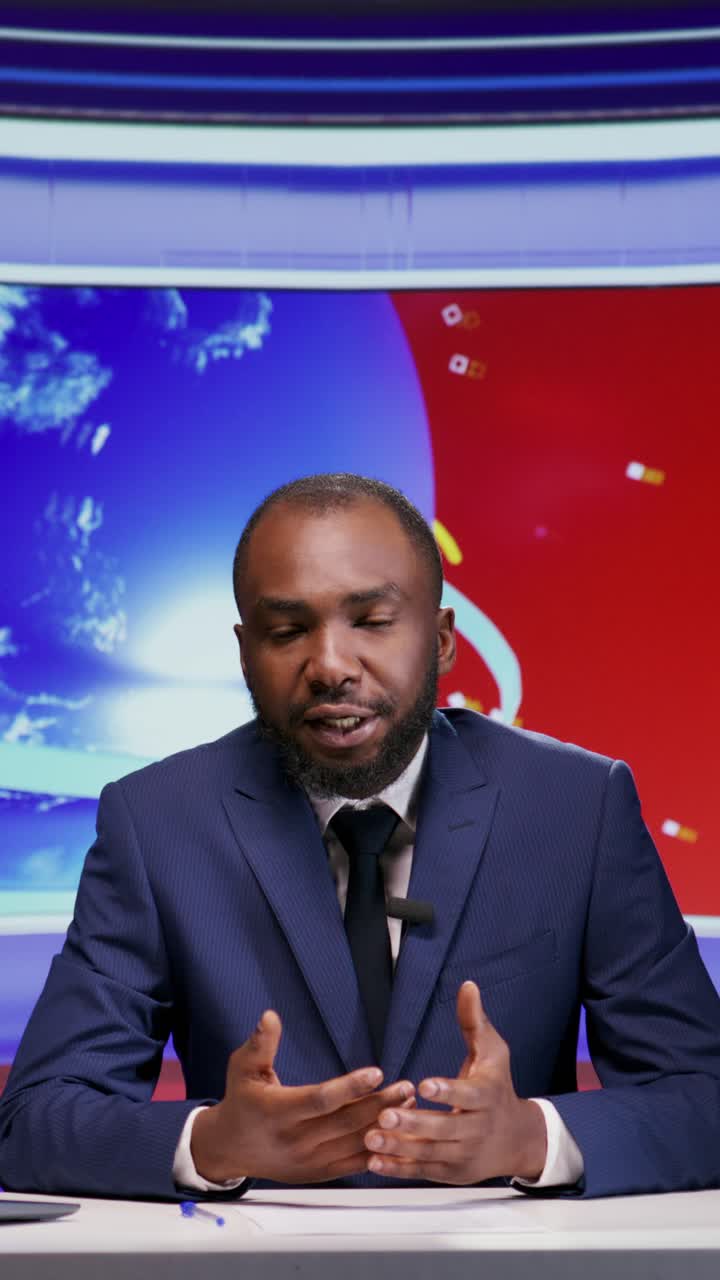 Vertical video African american news anchor in studio