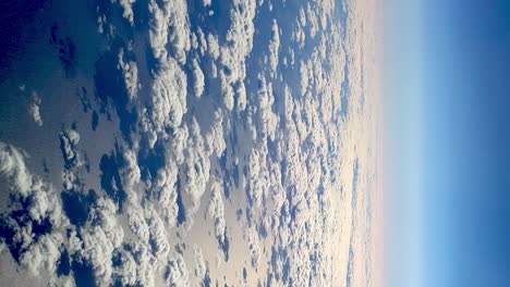 Aerial-breathtaking-view-of-clouds-reflecting-on-sea-surface