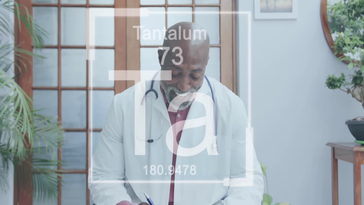 Animation of elements symbols over african american male doctor having video call