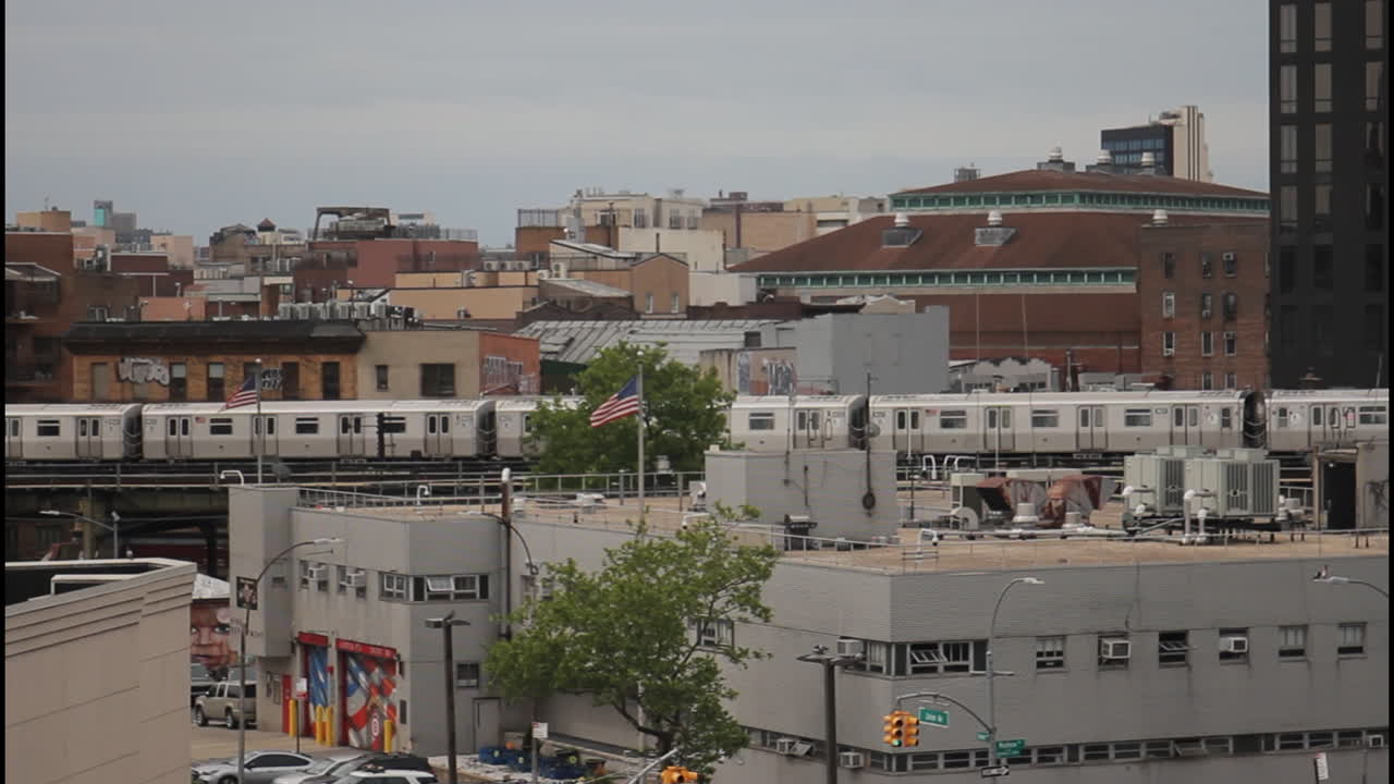 New York City Subway Train in Urban Neighborhood