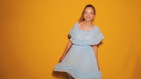 happy woman in a blue dress