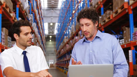 warehouse workers working together