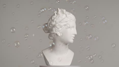 antique bust with soap bubbles