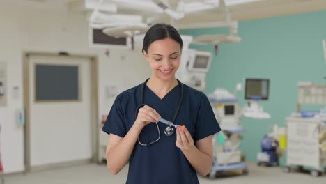 Happy-Indian-female-doctor-giving-vaccine