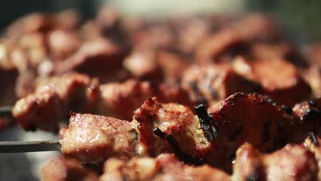 grilling shashlik on barbecue grill. marinated shashlik preparing on a barbecue grill over charcoal