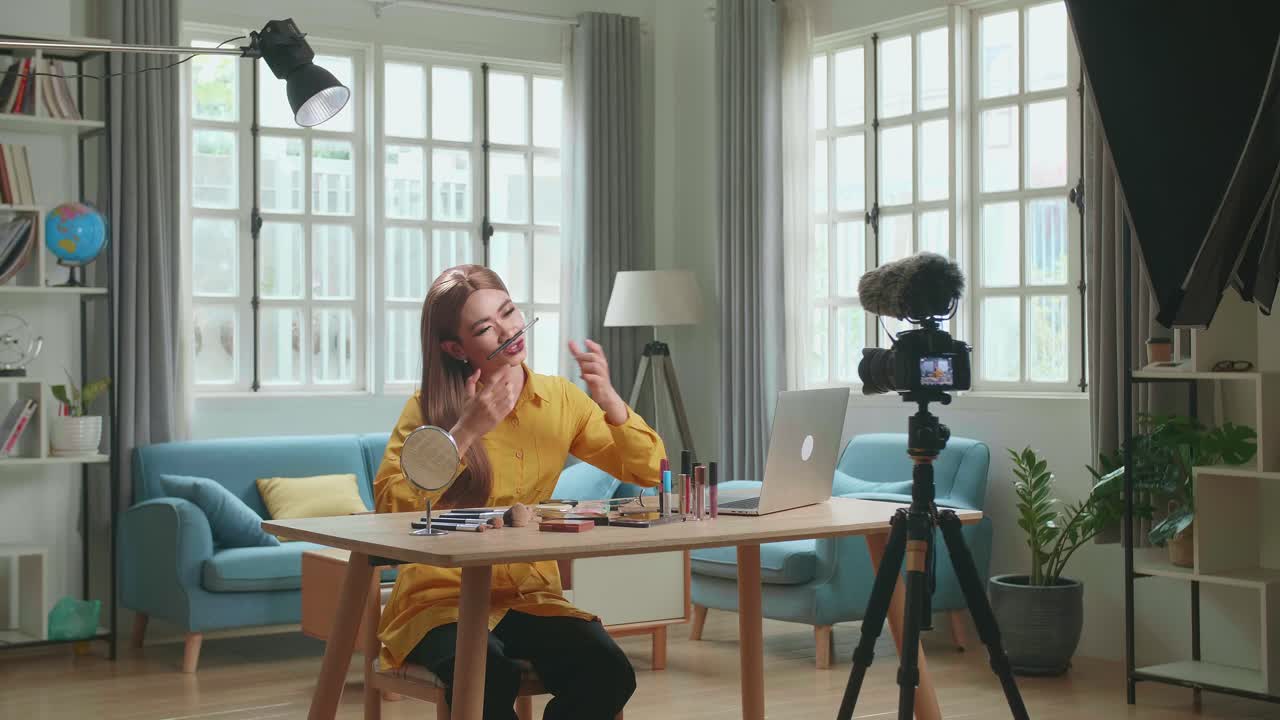 Funny Influencer Young Transgender Woman Blogger Laugh And Smile, Makeup Tutorial Video At Home Studio