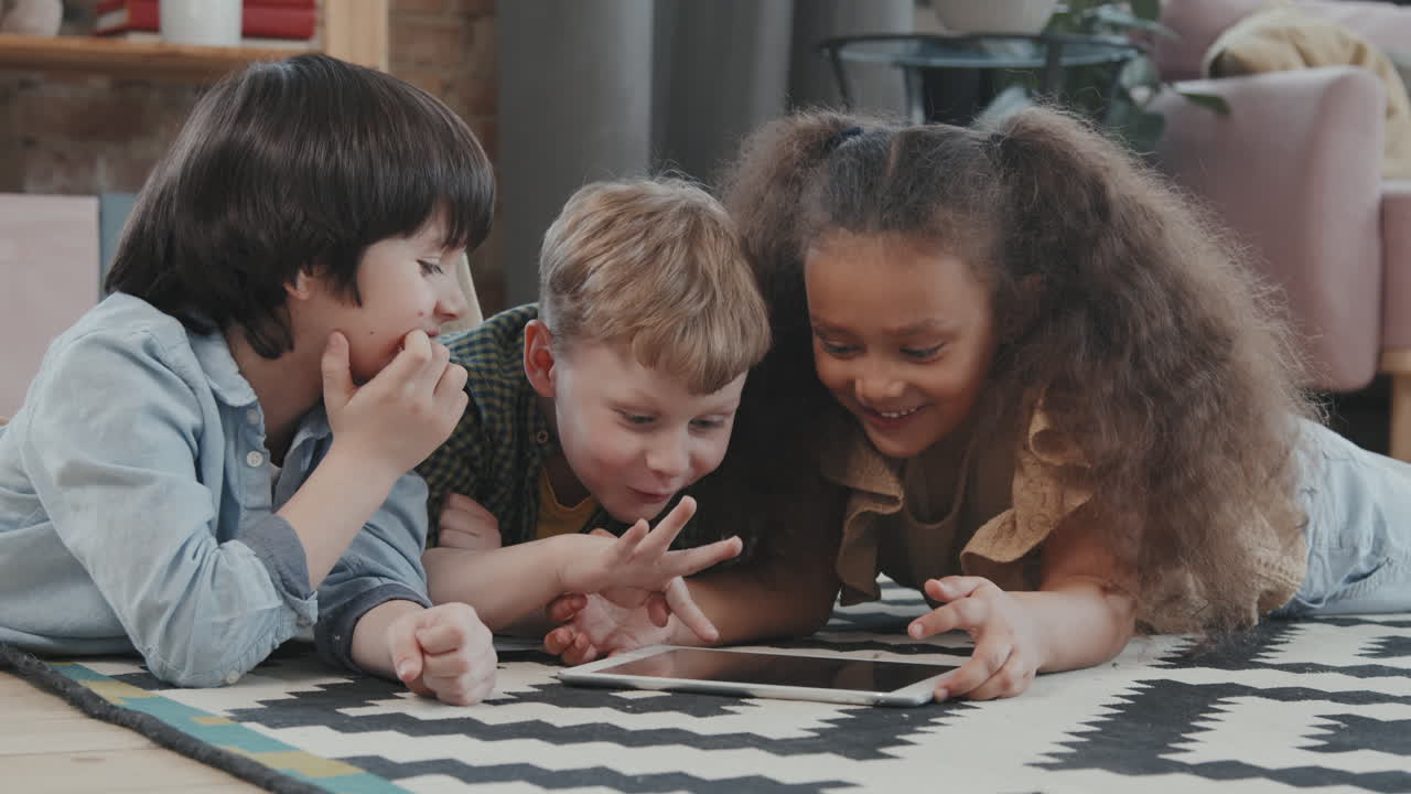 Adorable Kids Using Tablet