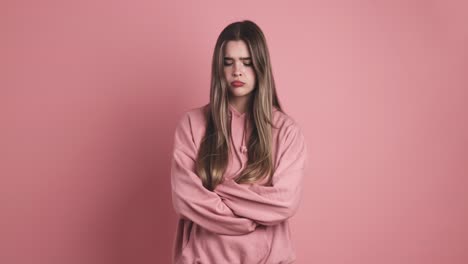 angry young beauty woman standing with arms crossed