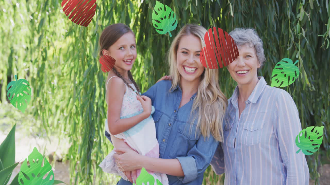 정원에서 웃는 백인 다세대 여성들에 대한 심장과 잎의 애니메이션