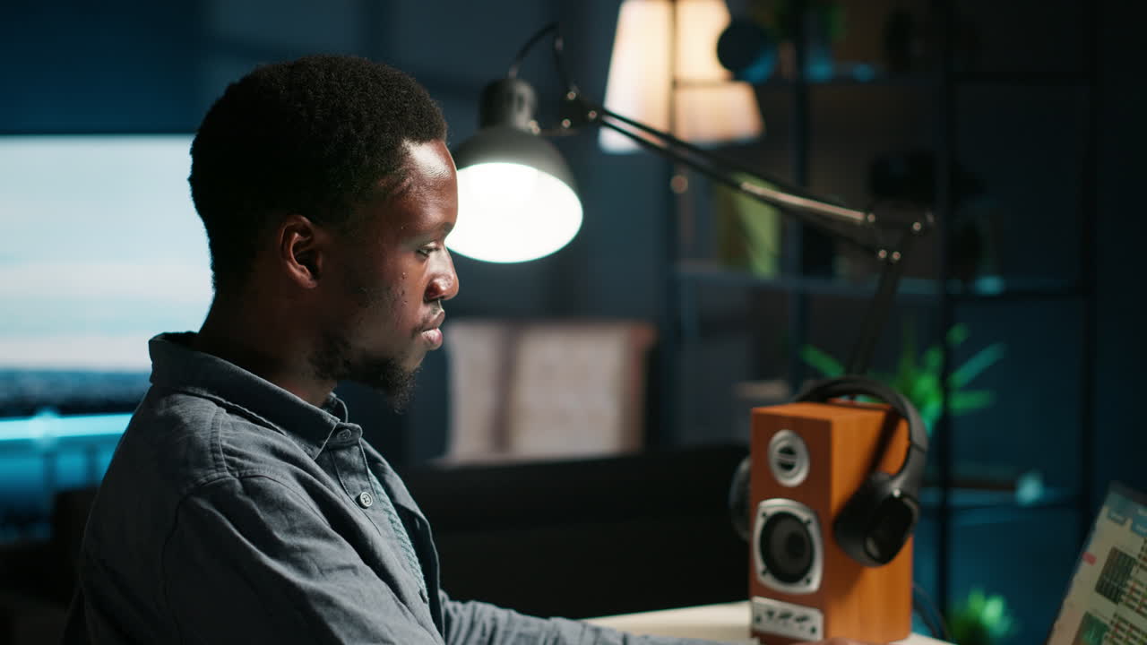 Frustrated african american worker suffers from exhaustion as he works from home