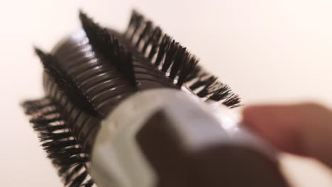 using a round hair brush