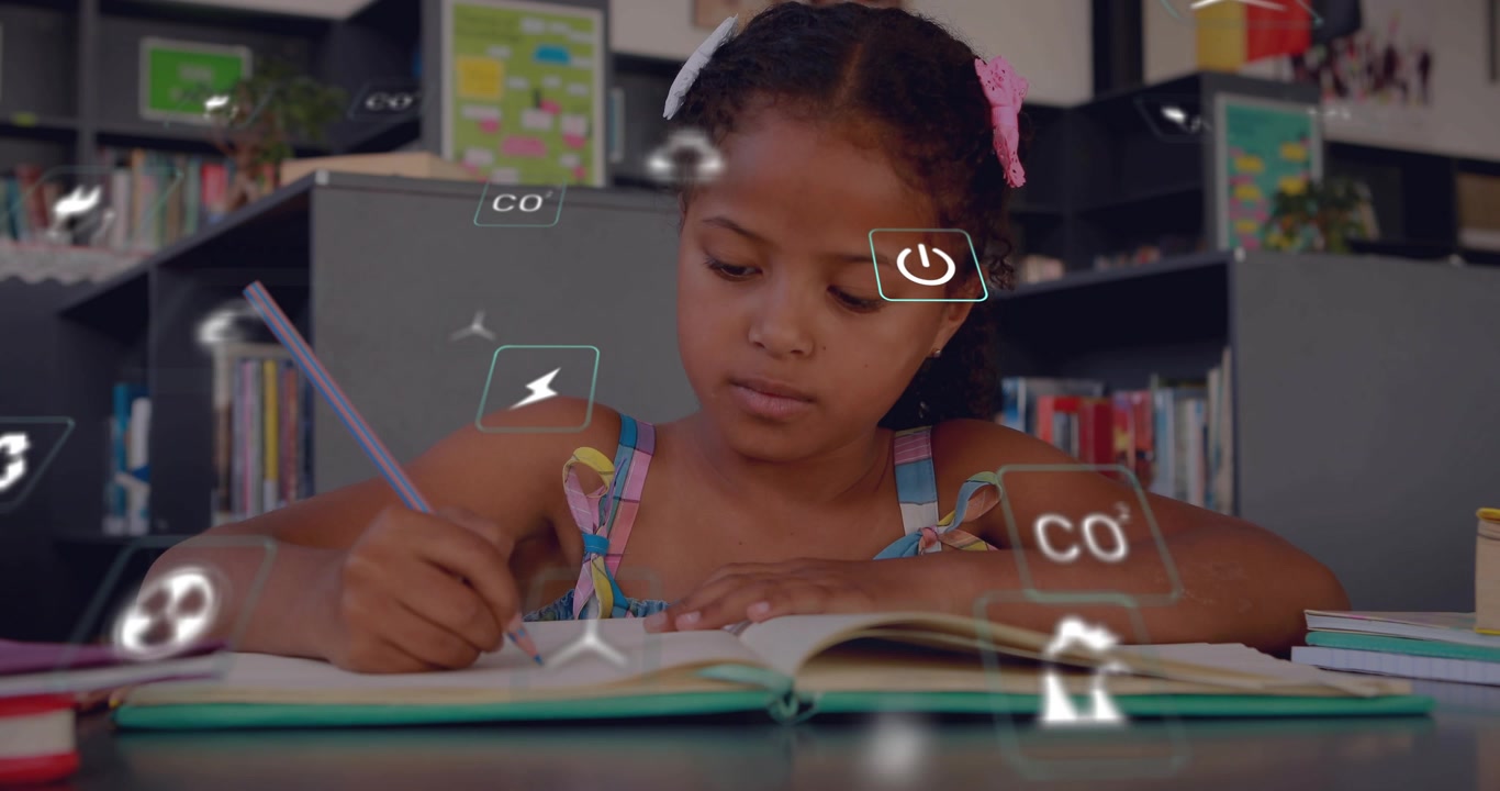 Elementary-age girl starting writing in study notebook and summoning floating sustainability icons