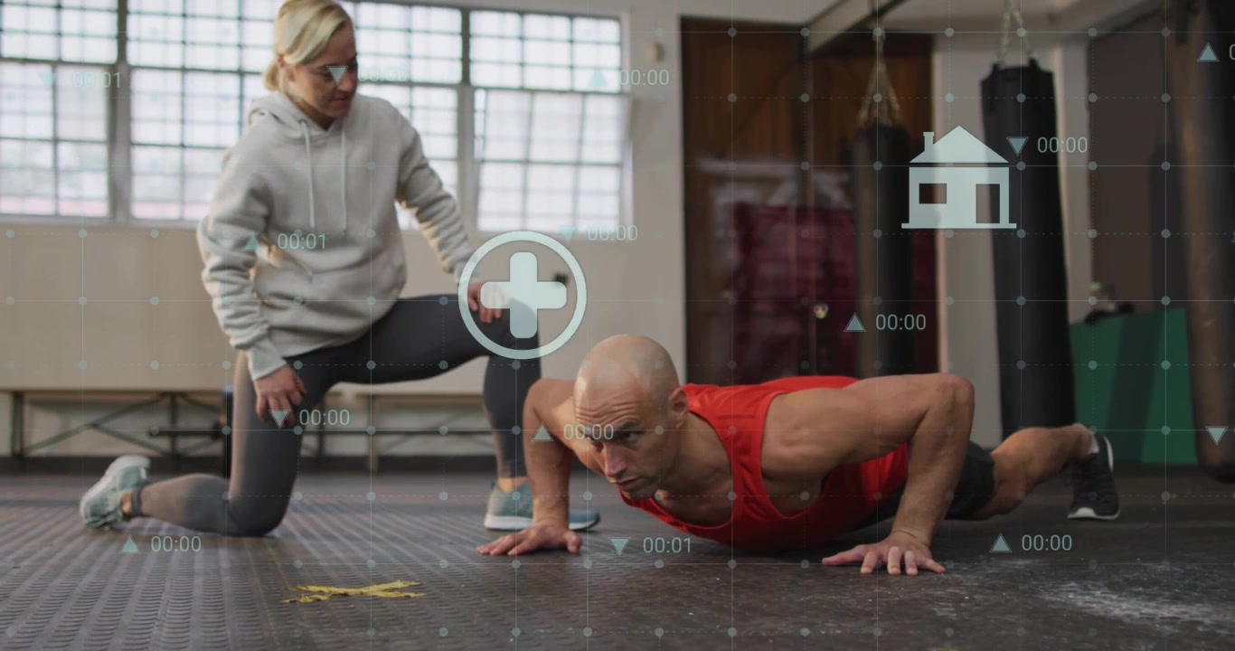 Coaching trainer cueing trainee in red tank doing pushups on gym floor for technique, HUD overlays