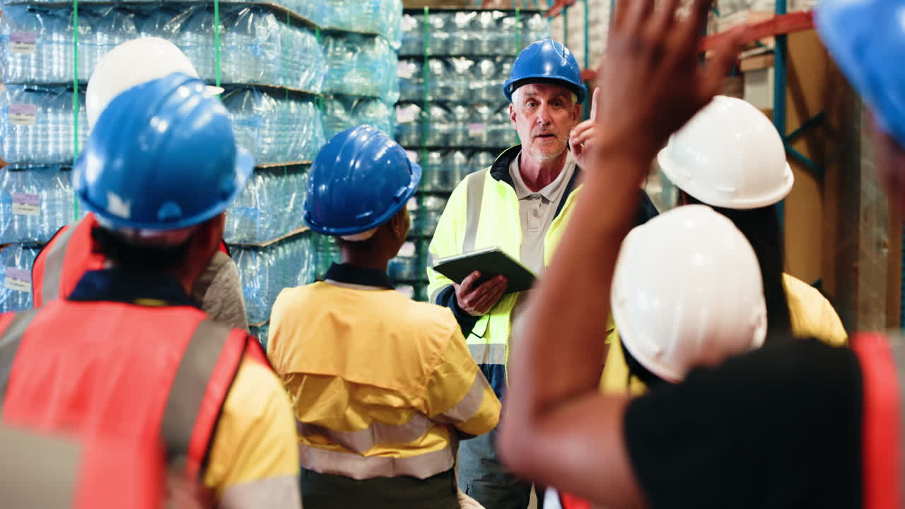 Warehouse Manager Briefing Diverse Team of Workers in Industrial Setting