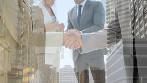 Animation-of-cityscape-over-business-handshake