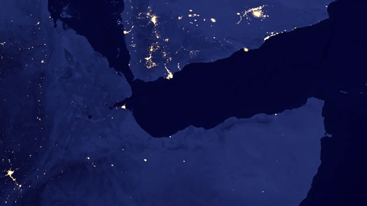 Un mappamondo digitale ruota e si ingrandisce su Gibuti città, evidenziando le città regionali con le luci notturne.