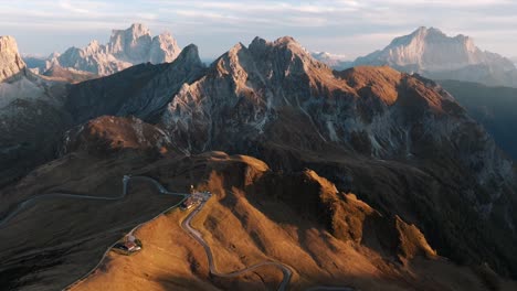 aerial view of mountain peaks during sunrise in the dolomites, italy