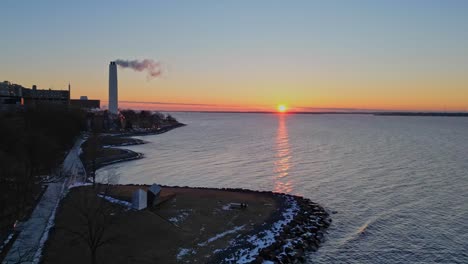 Aerial-Sunrise-Timelapse-during-winter-view-by-waterfront