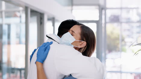 Doctor,-sad-woman-and-crying-with-hug-in-support