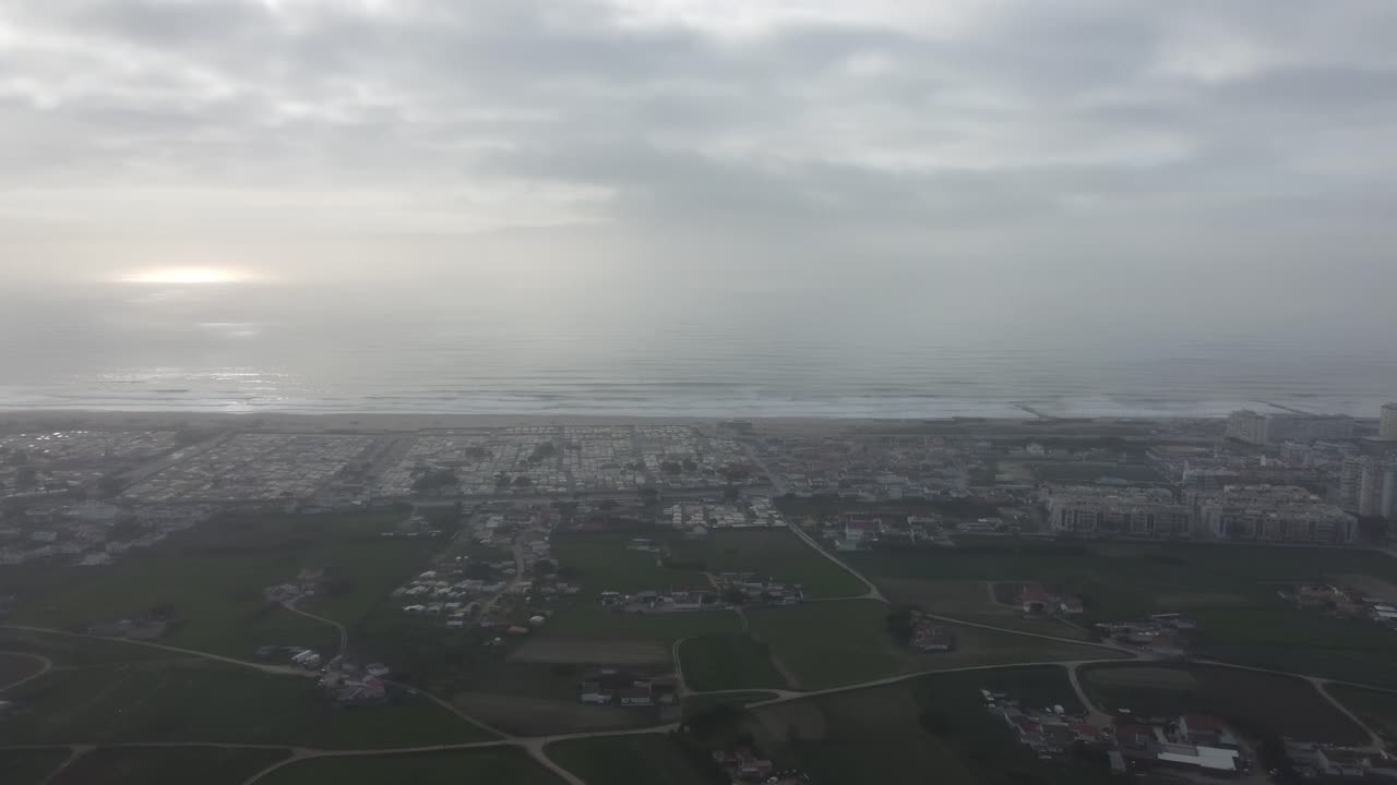 180 Degrees pan to the left of the beautiful coastline in Portugal on a misty morning.