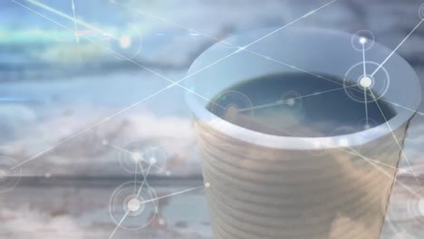 Animation-of-network-of-connections-over-cup-of-coffee