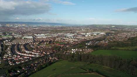 Aerial-flyover-of-east-Belfast-from-the-countryside-looking-towards-the-city-centre-or-center